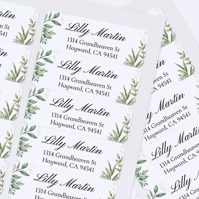 XOXOKristen sheet of multiple personalized greenery return address labels with white background, watercolor foliage, and black lettering - XOXOKristen