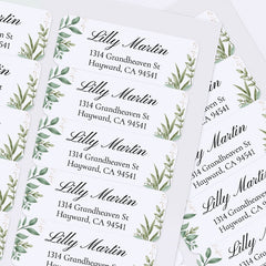 XOXOKristen sheet of multiple personalized greenery return address labels with white background, watercolor foliage, and black lettering - XOXOKristen