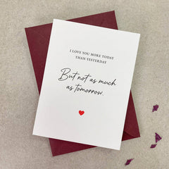 Love card displayed with deep red envelope, featuring minimalist typography and heart design, perfect for anniversaries or Valentine’s Day — XOXOKristen.